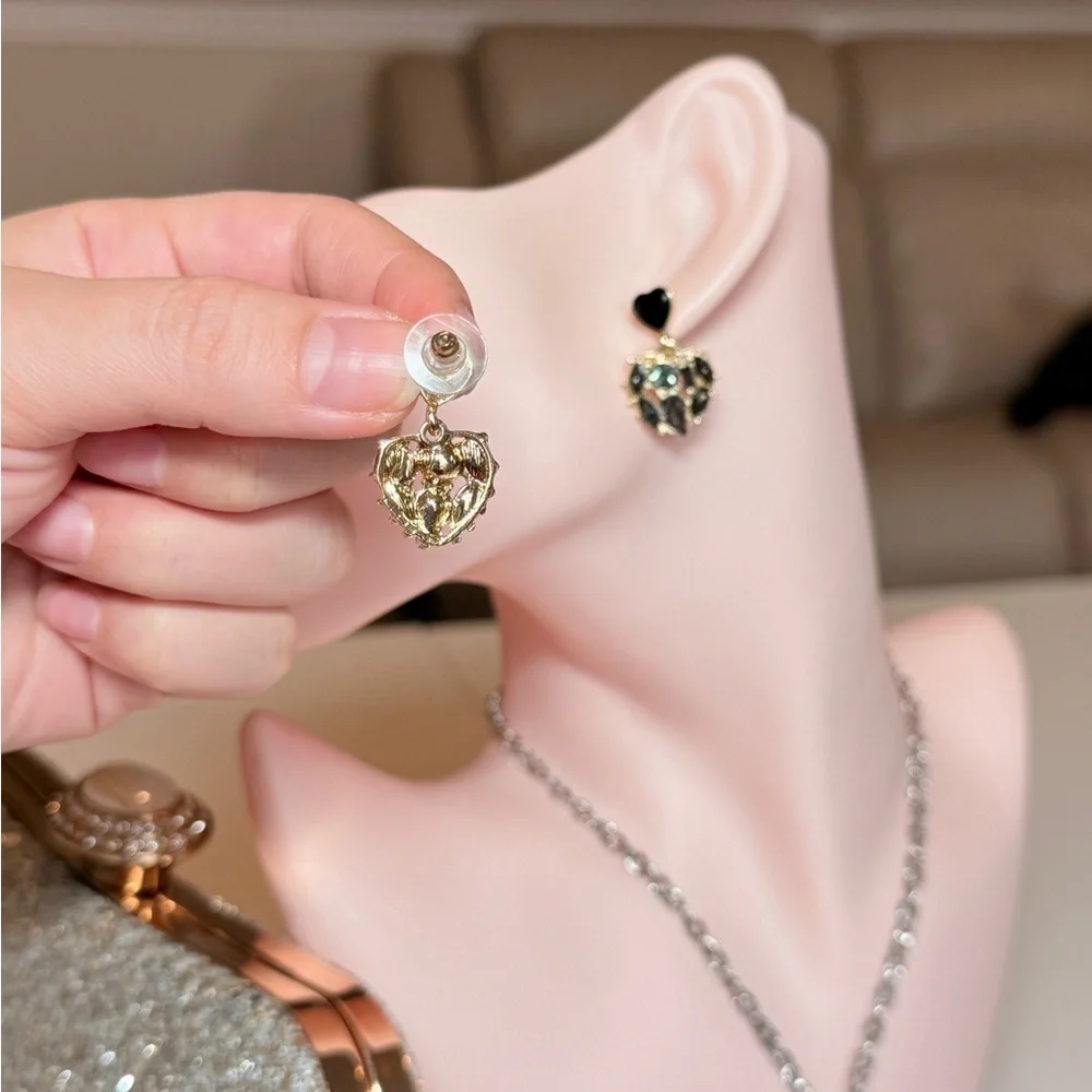Elegant Black and Gold Heart Earrings